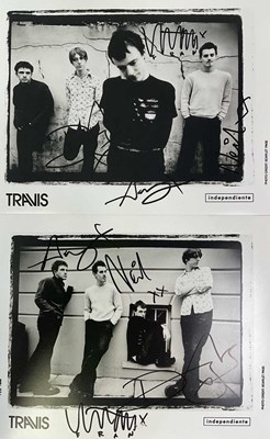 Lot 1767 - TRAVIS; two black and white photo promotional...