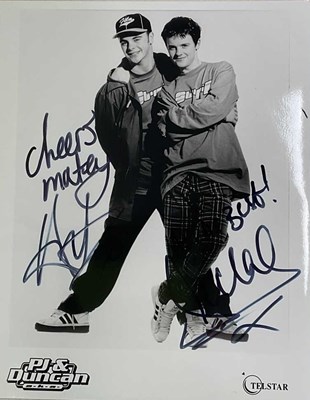 Lot 1748 - ANT & DEC; a black and white promotional card...
