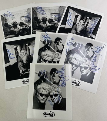 Lot 1750 - DODGY; seven black and white promotional...