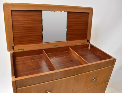 Lot 23 - A mid-20th century oak chest of four short and...