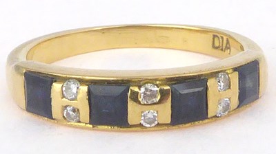 Lot 779 - A 9ct gold sapphire and diamond ring