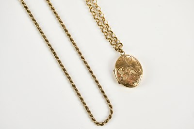 Lot 1618 - A 9ct yellow gold hoop link chain suspending a...