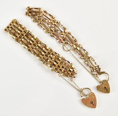 Lot 1543 - Two 9ct gold gate link bracelets, each with...