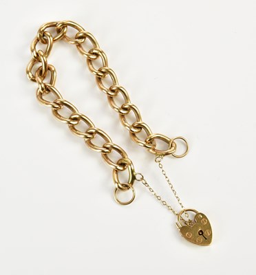 Lot 1544 - A 9ct yellow gold bracelet with padlock clasp,...