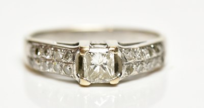 Lot 1354 - An 18ct white gold and diamond ring, the...