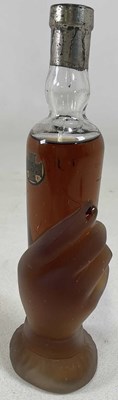 Lot 138A - An unusual clear and frosted glass bottle of...