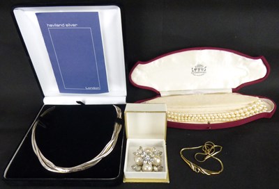 Lot 948 - A 9ct gold necklace with pear-shaped blue stone