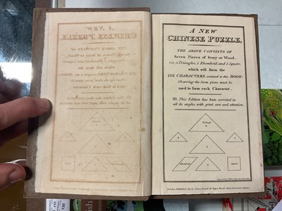 Lot 62 - A NEW CHINESE PUZZLE, engraved title and 31...