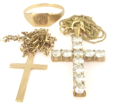 Lot 817 - Two 9ct gold crosses on necklace chains