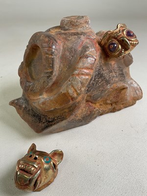 Lot 1011 - A South American Inca inspired carved crystal...