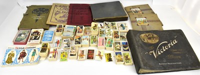 Lot 591 - Seven albums of cigarette cards