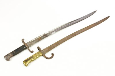 Lot 1392 - Two sword bayonets, one with 57.5cm blade and...
