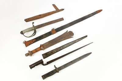 Lot 1386 - A Brown Bess type bayonet with leather...