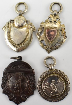 Lot 663 - Three hallmarked silver prize fobs