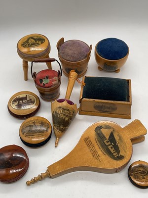 Lot 25 - MAUCHLINE WARE; eleven pin cushions of...