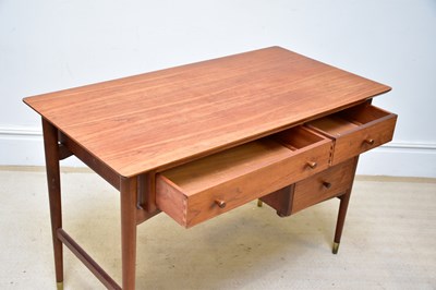 Lot 15 - A mid century teak desk, with an arrangement...