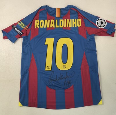 Lot 1962 - RONALDINHO; a replica Barcelona shirt signed...