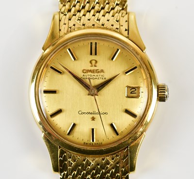 Lot 1816 - OMEGA; an 18ct gold cased Constellation...