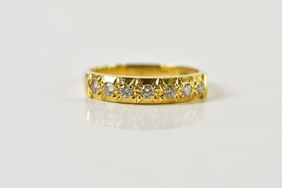 Lot 1472 - An 18ct yellow gold seven stone collet set...