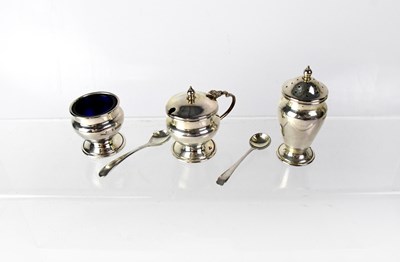 Lot 903 - A cased Elizabeth II hallmarked silver cruet...