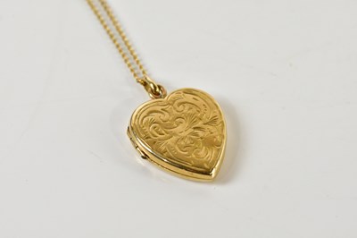 Lot 406 - A 9ct yellow gold heart shaped locket with...