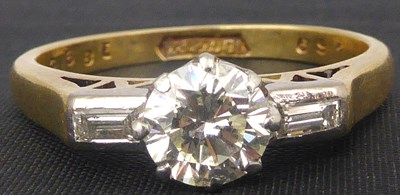 Lot 720 - An 18ct gold diamond ring, the principal...