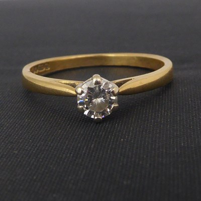 Lot 731 - A 18ct gold solitaire diamond ring, the...