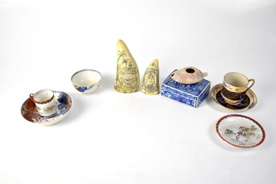 Lot 431 - An early 20th century Japanese cup and saucer