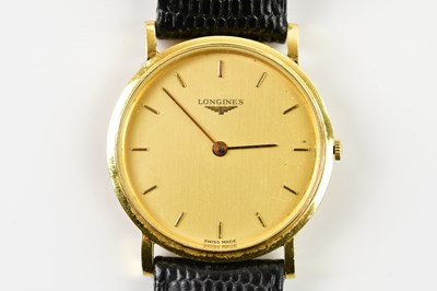 Lot 1833 - LONGINES; a gentleman's 18ct gold cased...
