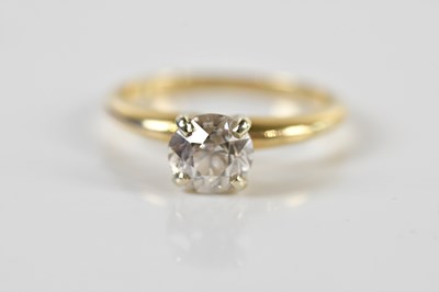 Lot 1309 - A yellow metal diamond solitaire ring, the...
