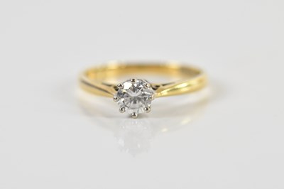 Lot 1459 - An 18ct yellow gold diamond solitaire ring,...