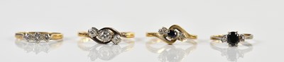 Lot 1387 - An 18ct yellow gold diamond illusion set three...