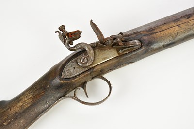 Lot 1463 - An early 19th century 12 bore flintlock...