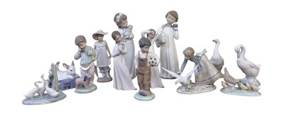 Lot 465 - NAO; a collection of twelve porcelain figures...