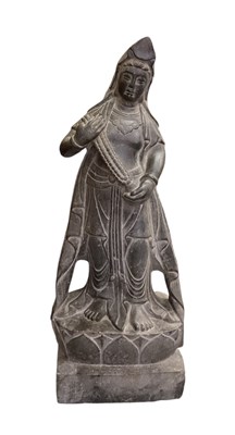 Lot 554 - A large Chinese carved stone figure of Shou...