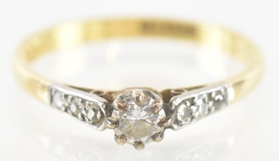 Lot 754 - An 18ct yellow gold and platinum diamond...