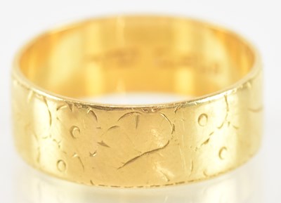 Lot 737 - A 22ct yellow gold ring, size P, approx 4.7g.