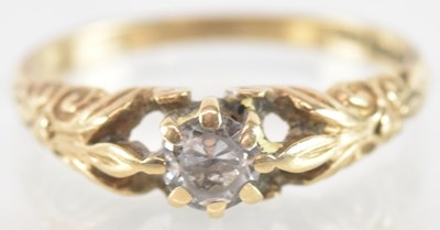 Lot 841 - A 9ct yellow gold white stone set ring, size R,...