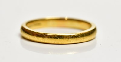Lot 1378 - A 22ct yellow gold wedding band, size Q,...