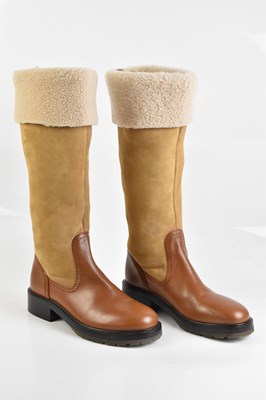 Lot 2089 - CHLOÉ; a pair of natural brown suede shearling...