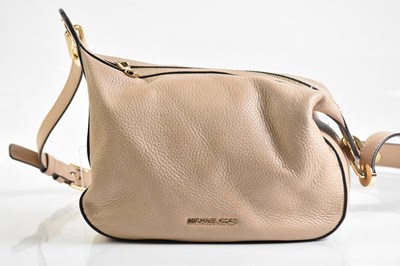 Lot 2066 - MICHAEL KORS; a nude pebbled leather crossbody...
