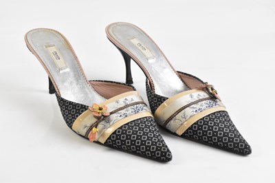 Lot 2097 - PRADA; a pair of stiletto mules, with black...