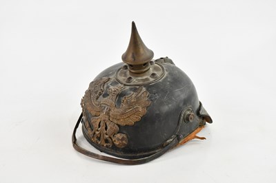 Lot 2526 - A German WWI pickelhaube, the crowned eagle...
