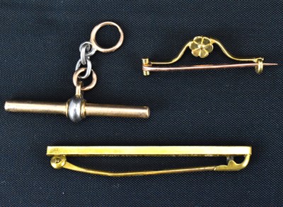Lot 804 - A yellow metal floral brooch, length 3cm,...