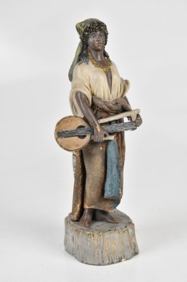 Lot 2751 - DEPONIRT; a German earthenware figure of an...