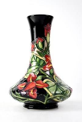 Lot 292 - MOORCROFT; a baluster vase of cylinder form...