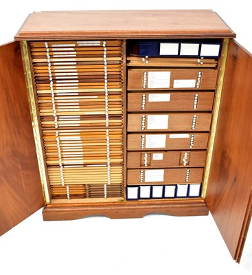 Lot 100 - A wooden two-door coin cabinet with dividing...