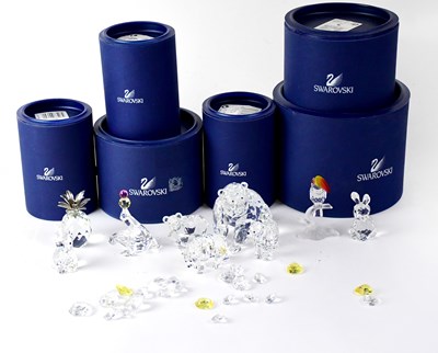 Lot 357 - SWAROVSKI; ten crystal figures of varying...