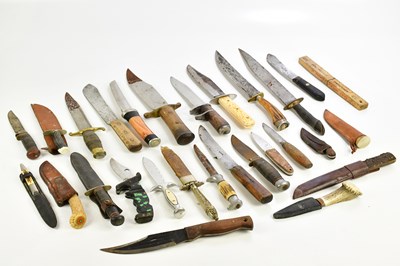 Lot 1338 - A large collection of Bowie knives, some with...