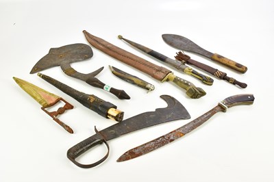 Lot 1369 - A collection of ethnic knives including an...